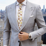 Beige Necktie With Brown And Yellow Paisley Pattern