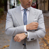 Light Blue With Black And White Striped Necktie