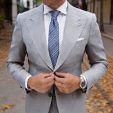 Light Blue With Black And White Striped Necktie