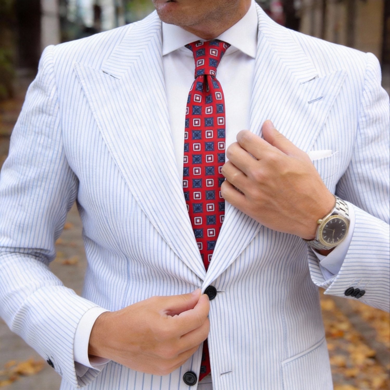 Red Necktie with White Geometric Patterns