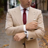 Red Necktie With Blue And Yellow Diamonds